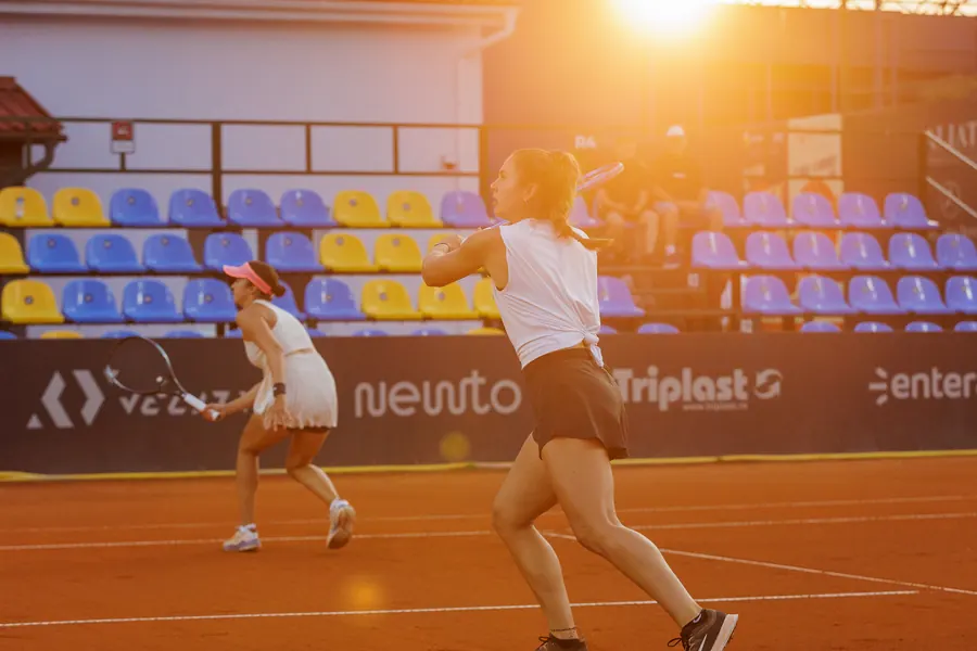 Doubles match at sunset on the centre court