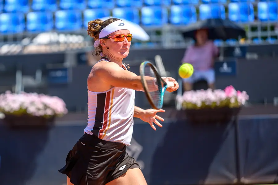 Player hitting on clay at the Axeria Open